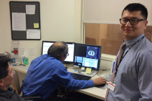 Kaifang Du reviewing 4D CT images with Dinesh Tewatia and Idarto Tan. Late 2015.
