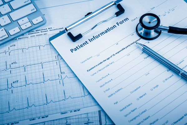 Stethoscope on cardiogram concept for heart care