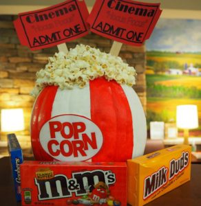 decorated pumpkin, bag of popcorn