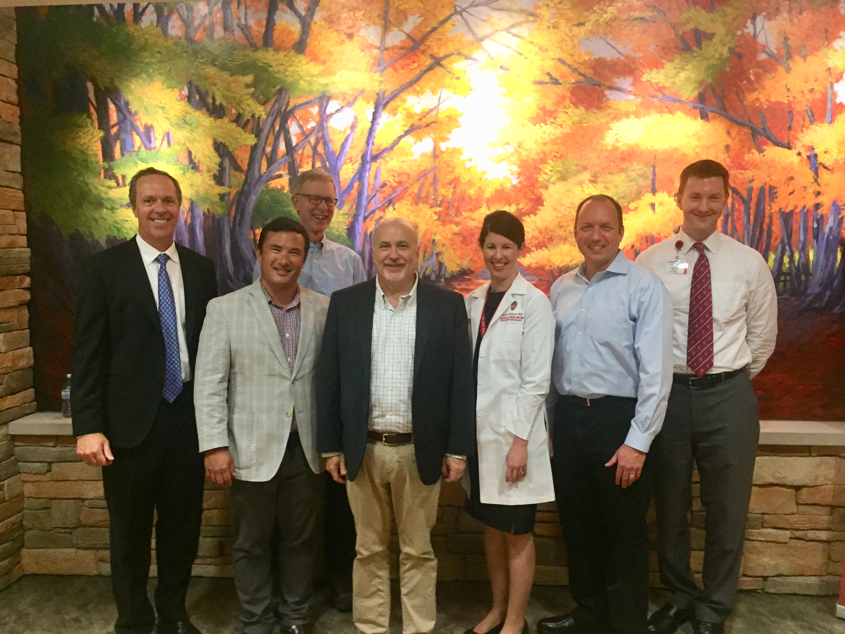 L to R) DHO Department Chairman Dr. Paul Harari, DHO Associate Professor Dr. Randy Kimple, Patient Advocate Marshall Flax, U.S. Representative Mark Pocan, DHO Staff Physicist Dr. Kathryn Mittauer, Patient Advocate Randy Eggert and DHO Assistant Professor Zac Labby.