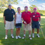 2019 Heads Up! Golf Outing participants on the course