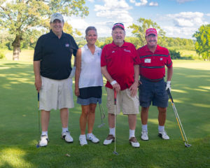 2019 Heads Up! Golf Outing participants on the course
