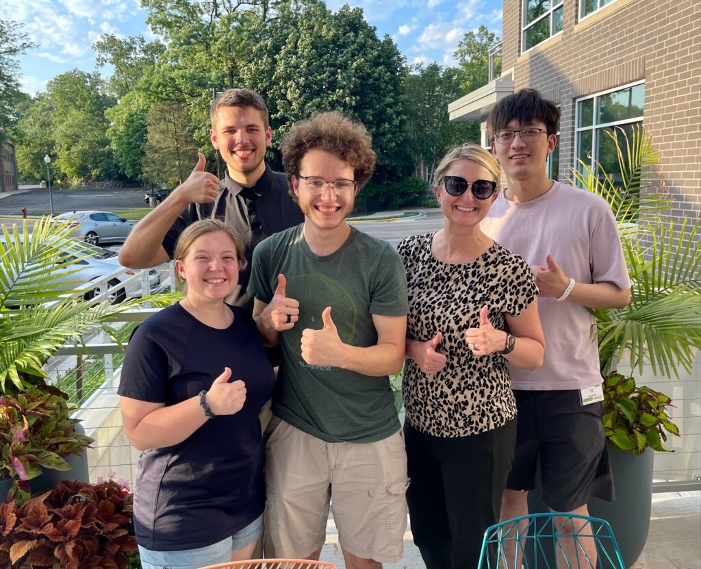 Outdoor image of Carri, Ken, Ken's wife, Nick, and Yuhao