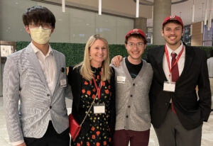 Image of Yuhao, Carri, Ken, and Nick at reception