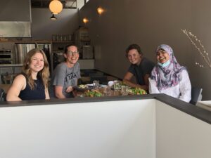 Four lab members at a restaurant.