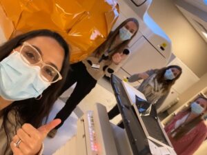 Lianna Di Maso, Jennie Crosby, Lindsay Bodart, and Christina Breeze in the treatment room