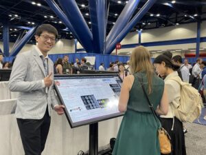 Image of poster viewing in convention center